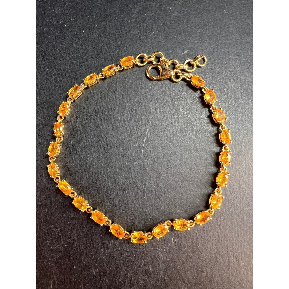 Yellow spessartine garnet tennis bracelet in gold over sterling silver